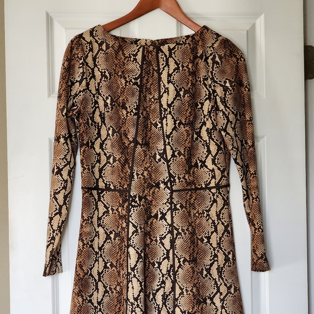Michael Kors leopard pattern A-line dress with accent piping and rear zipper.